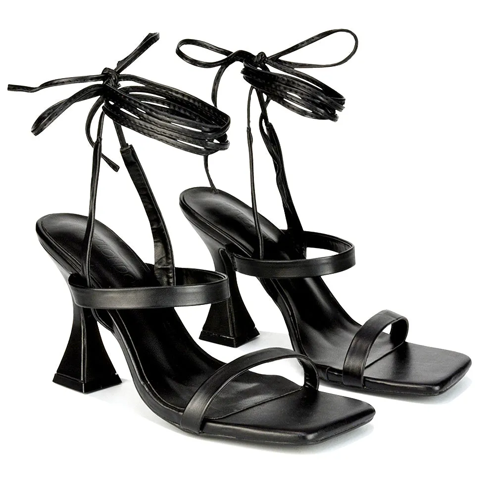 Taytum Square Toe Strappy Lace Up Sandal Flared High Heels in Black Synthetic Leather